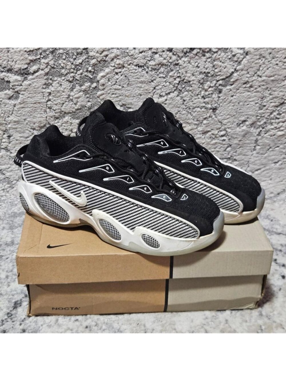cool Nike NOCTA Glide Black and White Drake shoes with the original box 💯